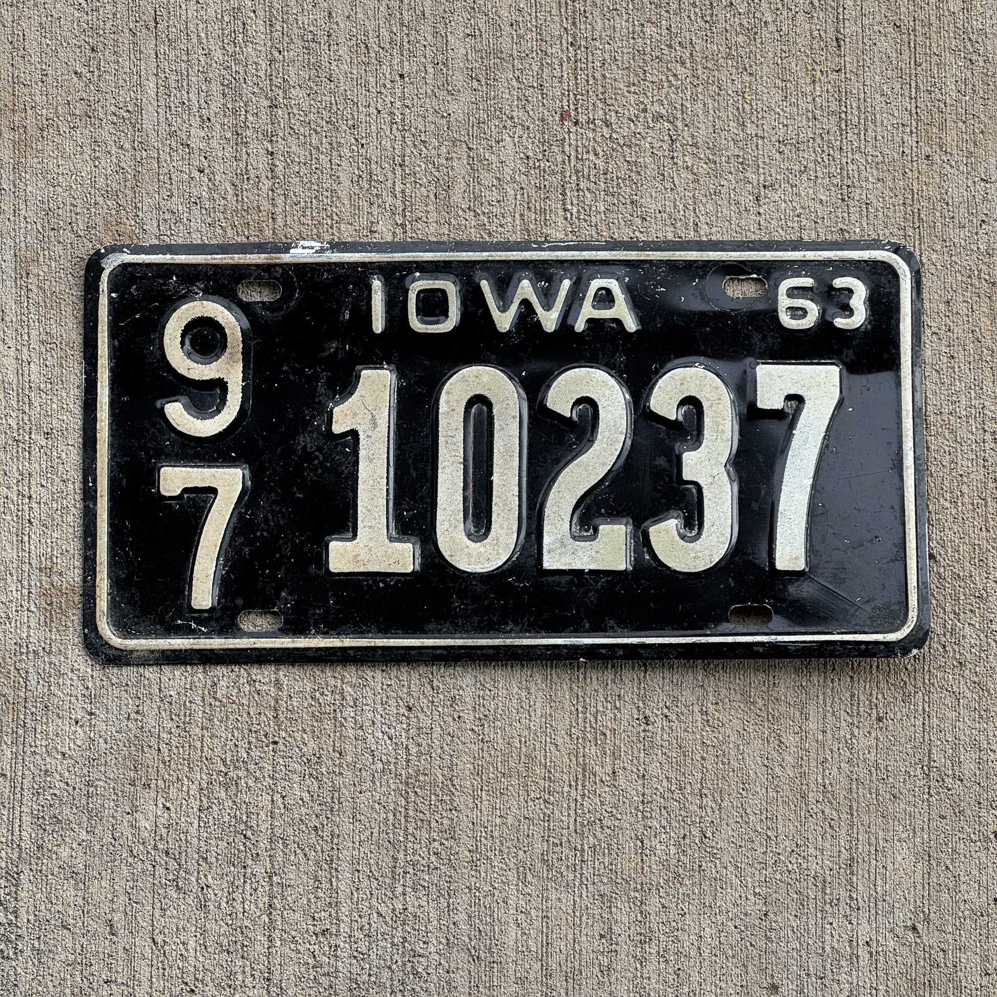 Photo of a 1963 Iowa License Plate Auto Tag Garage Decor Vintage 97 10237 with original patina