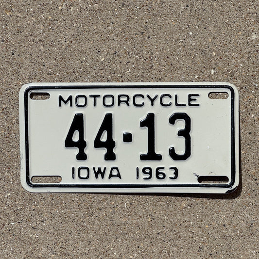 Photo of a 1963 Iowa Motorcycle License Plate Auto Tag Garage Decor Low Number Two Digit Henry County 44 13 with original patina