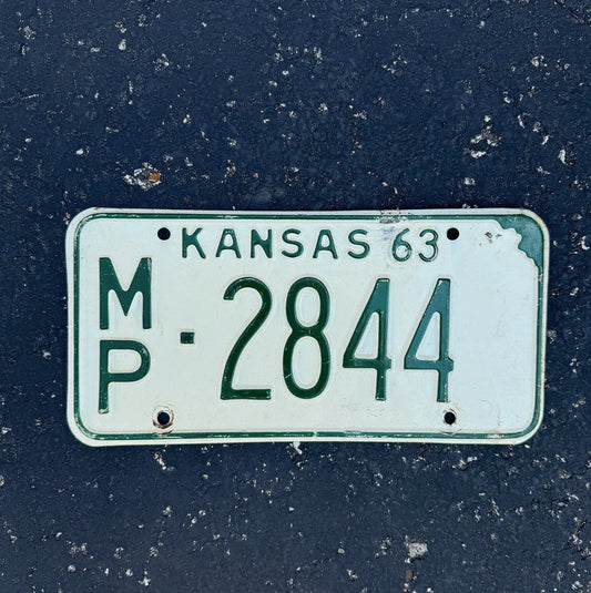 Photo of a 1963 Kansas License Plate Auto Tag Garage Decor Vintage State Shape MP 2844