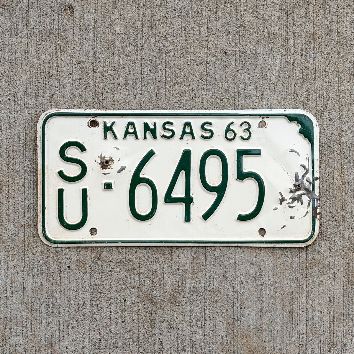 Photo of a 1963 Kansas License Plate Auto Tag Garage Decor Vintage SU 6495 with original patina