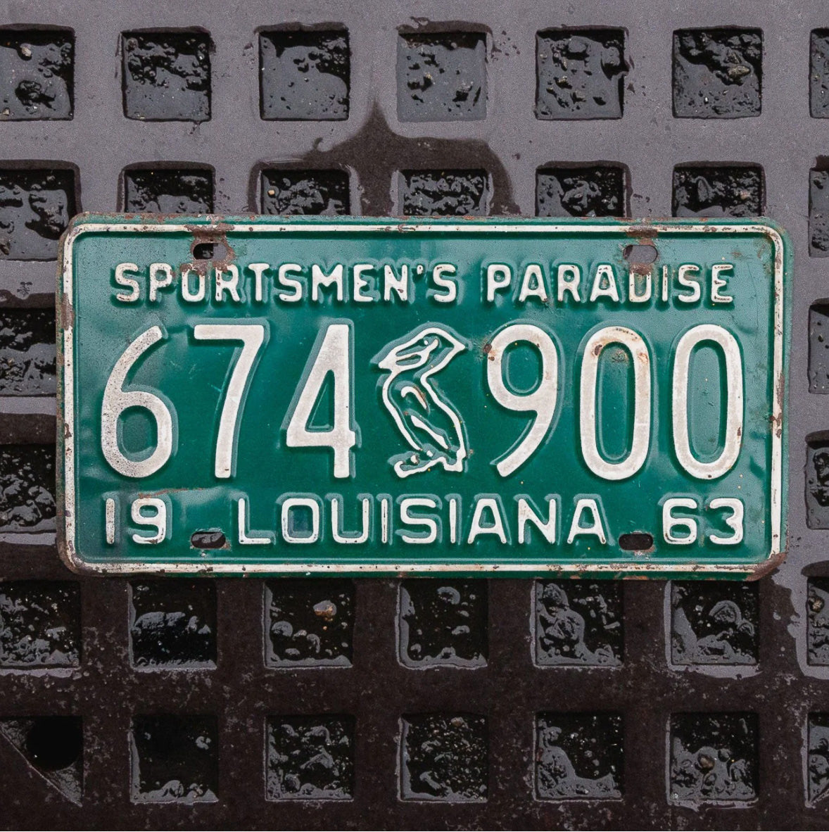 Photo of a 1963 Louisiana License Plate Auto Tag Garage Decor Vintage Iconic Pelican 674 900 with original patina