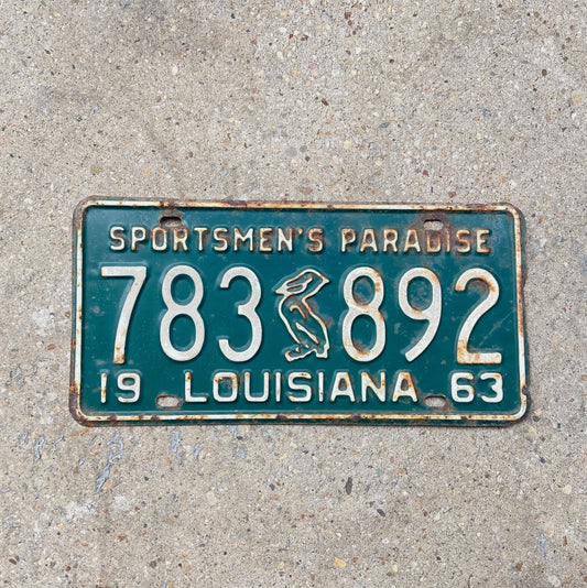 Photo of a 1963 Louisiana License Plate Auto Tag Garage Decor Vintage Iconic Pelicn 783 892 with original patina