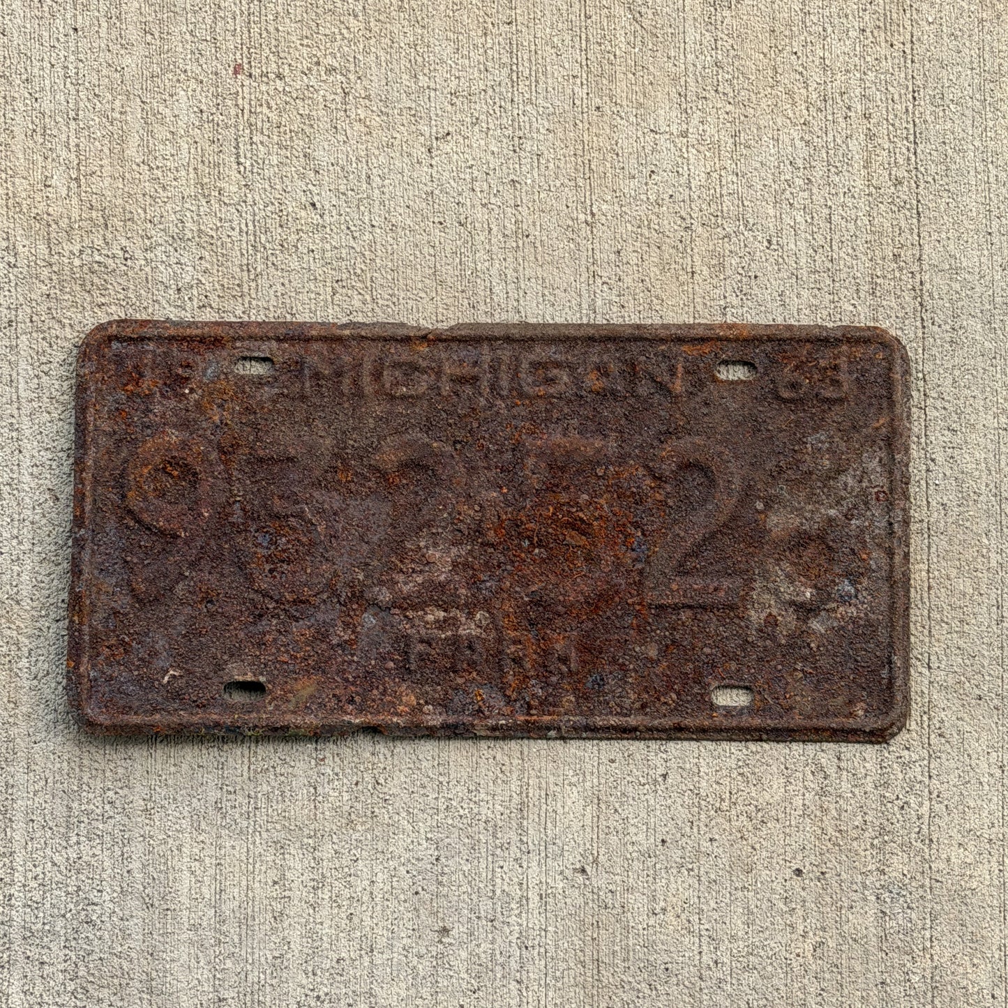 Photo of a 1963 Michigan Farm License Plate Auto Tag Garage Decor Vintage 932 526 with original patina