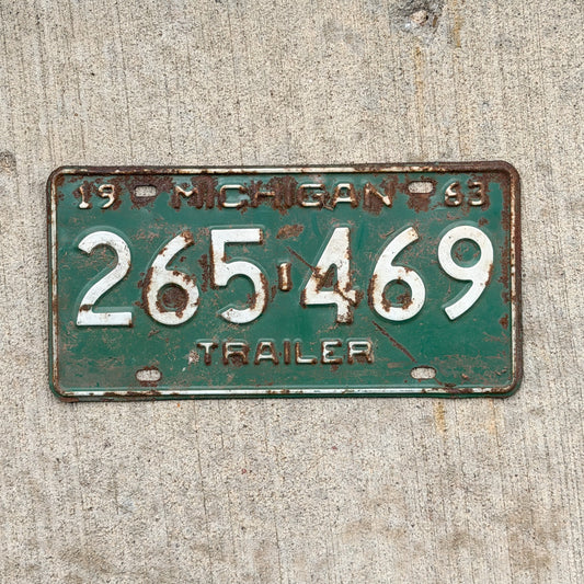 Photo of a 1963 Michigan Trailer License Plate Auto Tag Garage Decor Vintage 265 469 with original patina