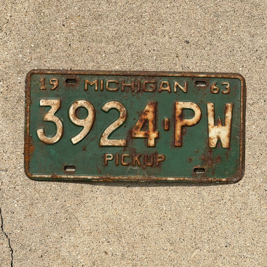 Photo of a 1963 Michigan Truck License Plate Auto Tag Garage Decor Vintage Pickup 3924 PW with original patina