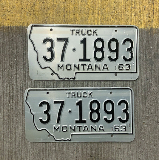 Photo of a 1963 Montana Truck License Plate Pair Auto Tag Garage Decor Vintage State Shape 37 1893 with original patina