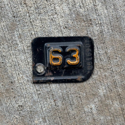 Photo of a 1963 New York Tab License Plate Auto Tag Garage Decor Vintage 1069190 with original patina