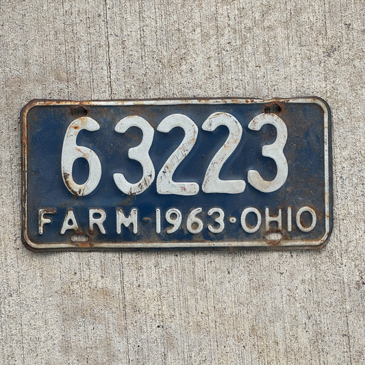 Photo of a 1963 Ohio Farm License Plate Auto Tag Garage Decor Vintage 6 3223 with original patina
