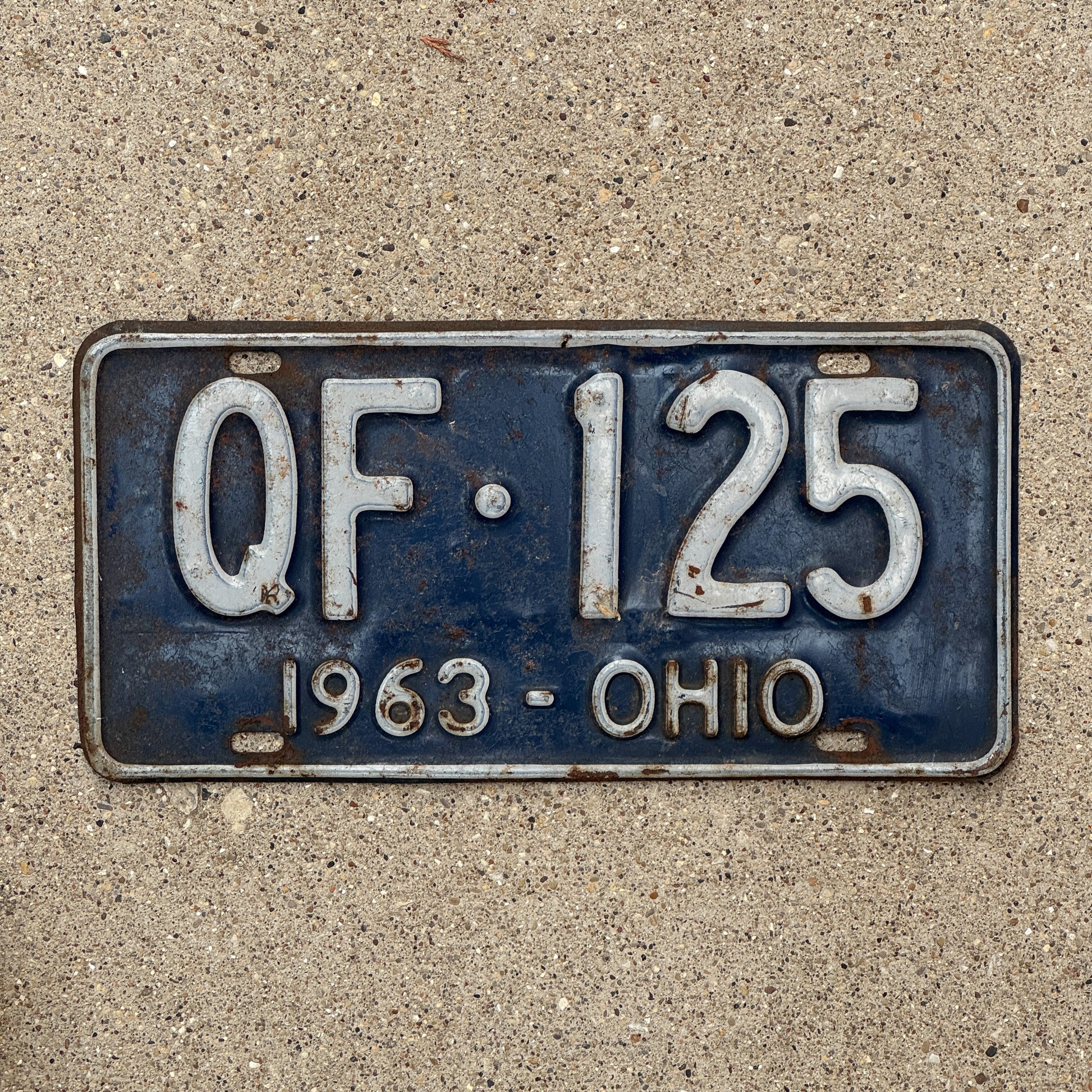 Photo of a 1963 Ohio License Plate Auto Tag 1 Vintage Garage QF 125 with original patina