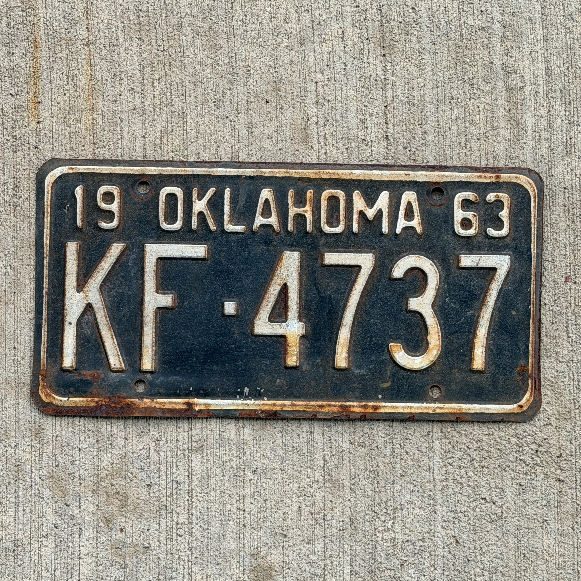 Photo of a 1963 Oklahoma License Plate Auto Tag Garage Decor Vintage KF 4737 with original patina