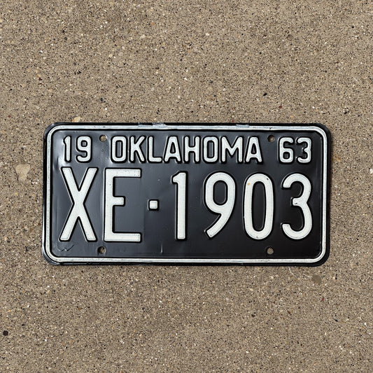 Photo of a 1963 Oklahoma License Plate Auto Tag Garage Decor Vintage XE 1903