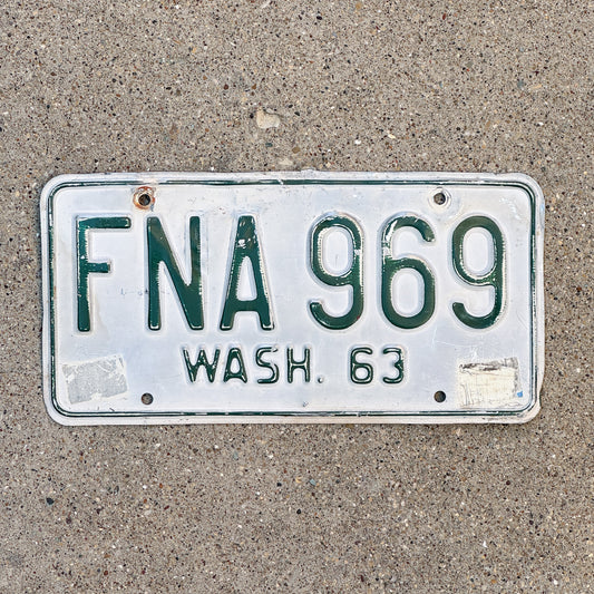 Photo of a 1963 Washington License Plate Auto Tag Garage Decor Vintage DMV Clear Number FNA 969 with original patina