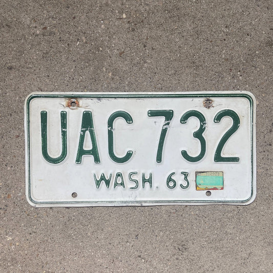 Photo of a 1963 Washington License Plate Auto Tag Garage Decor Vintage YOM DMV Clear UAC 732 with original patina