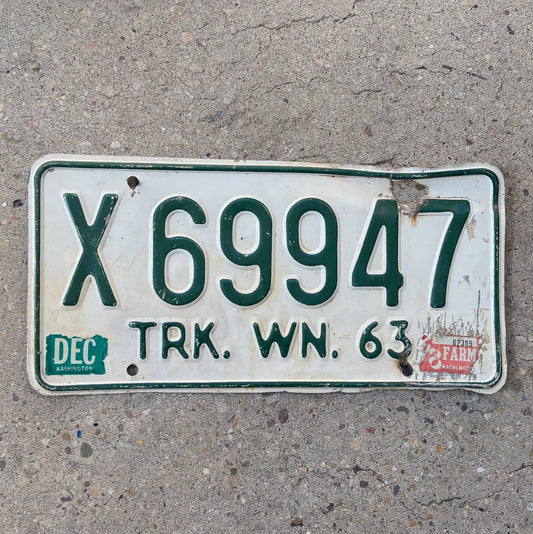 Photo of a 1963 Washington License Plate Auto Tag Garage Decor Vintage YOM DMV Clear X 66947 with original patina