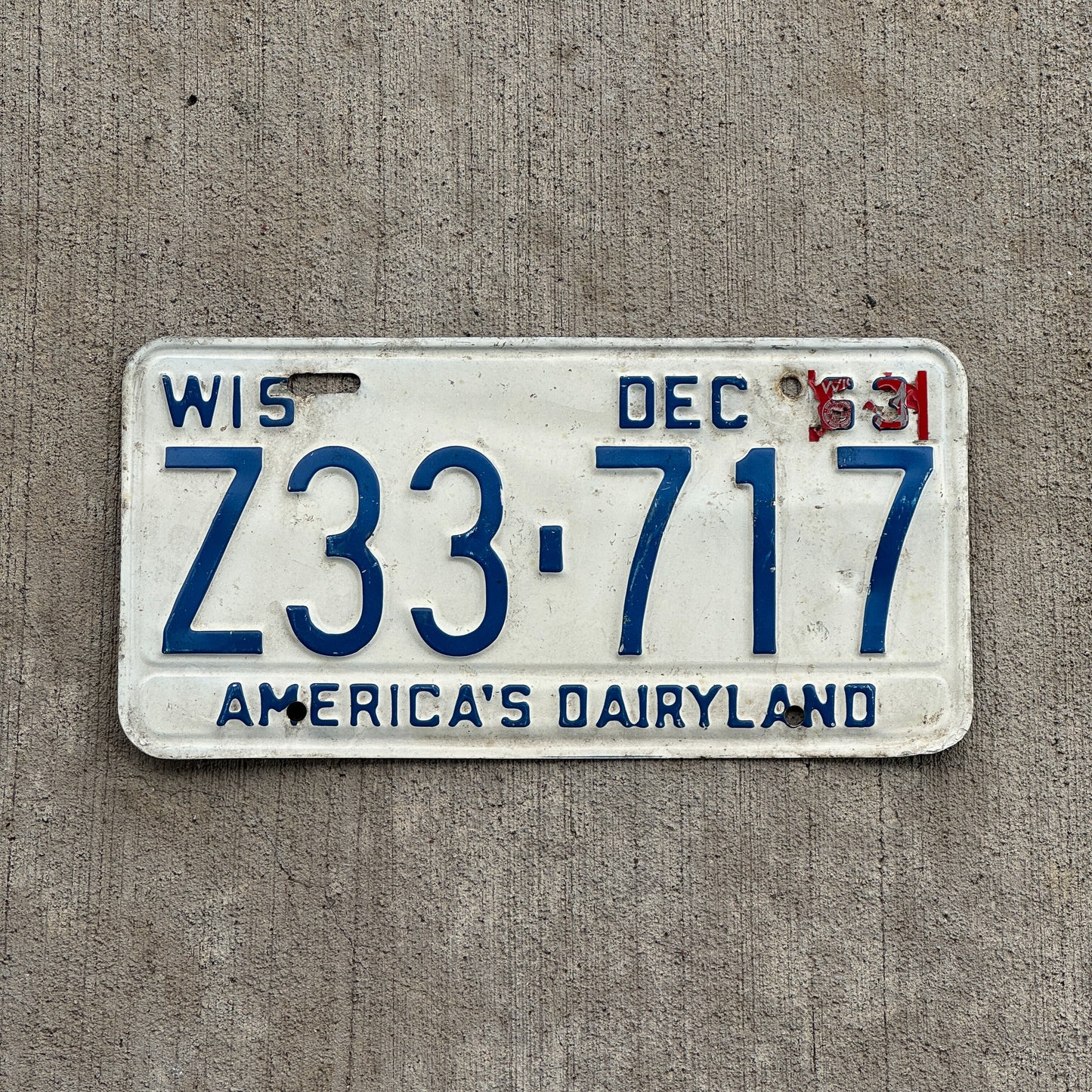 Photo of a 1963 Wisconsin License Plate Auto Tag Garage Decor Vintage Z33 717 with original patina