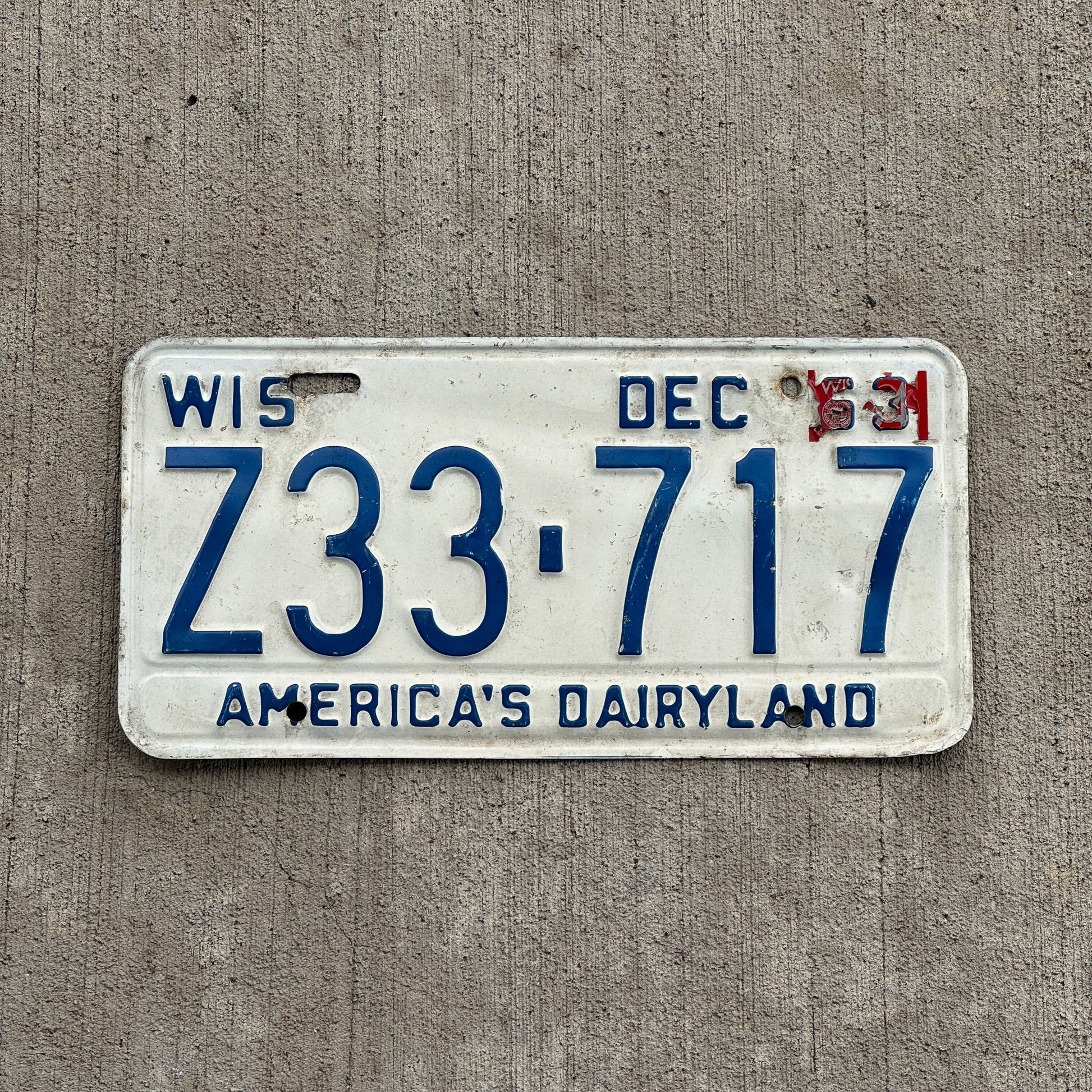 Photo of a 1963 Wisconsin License Plate Auto Tag Garage Decor Vintage Z33 717 with original patina