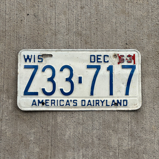 Photo of a 1963 Wisconsin License Plate Auto Tag Garage Decor Vintage Z33 717 with original patina