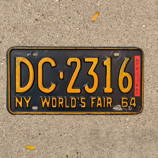 Photo of a 1964 1965 New York License Plate Auto Tag Garage Decor Vintage World's Fair DC 2316 with original patina