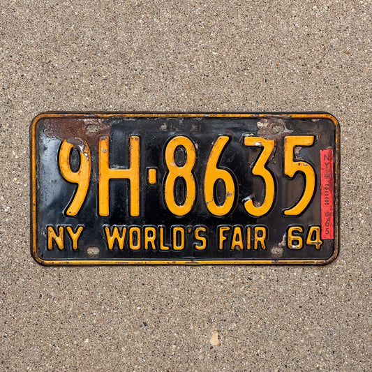 Photo of a 1964 1965 New York Special Omnibus License Plate Auto Tag Garage Decor Vintage World's Fair Bus 9H 8635 with original patina