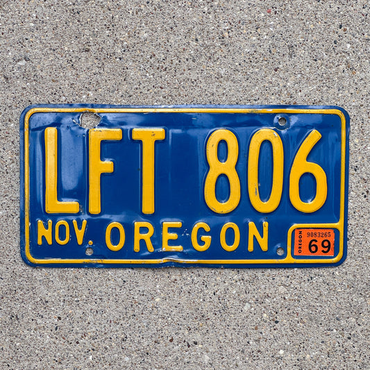 Photo of a 1964 1969 Oregon License Plate Auto Tag Garage Decor Vintage LFT 806 with original patina