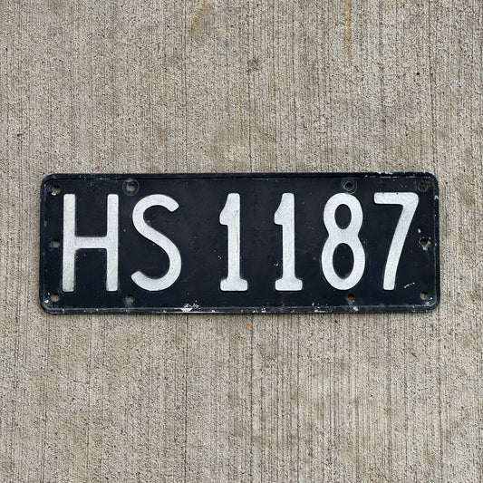 Photo of a 1964 1986 New Zealand License Plate Auto Tag Garage Decor Vintage HS 1187 with original patina