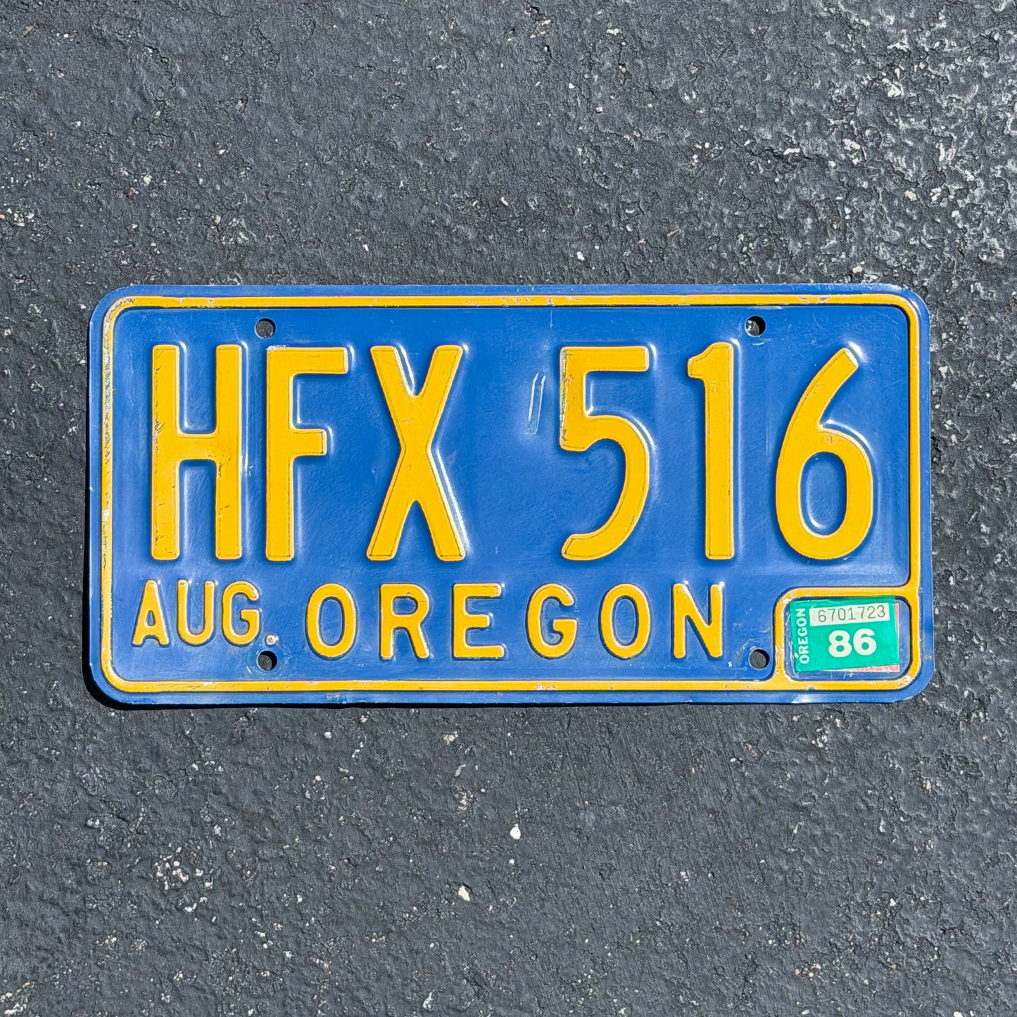 Photo of a 1964 1986 Oregon License Plate Auto Tag Garage Decor Vintage HFX 516 with original patina