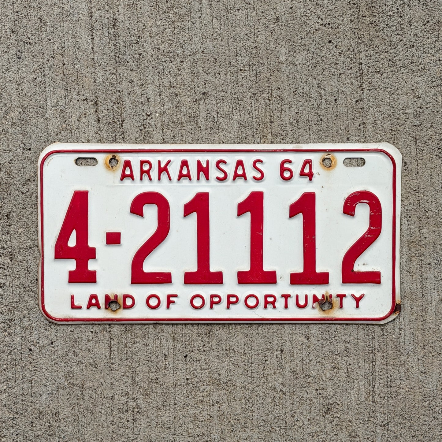 Photo of a 1964 Arkansas License Plate Auto Tag Garage Decor Vintage Repeat Repeating 4 21112 with original patina