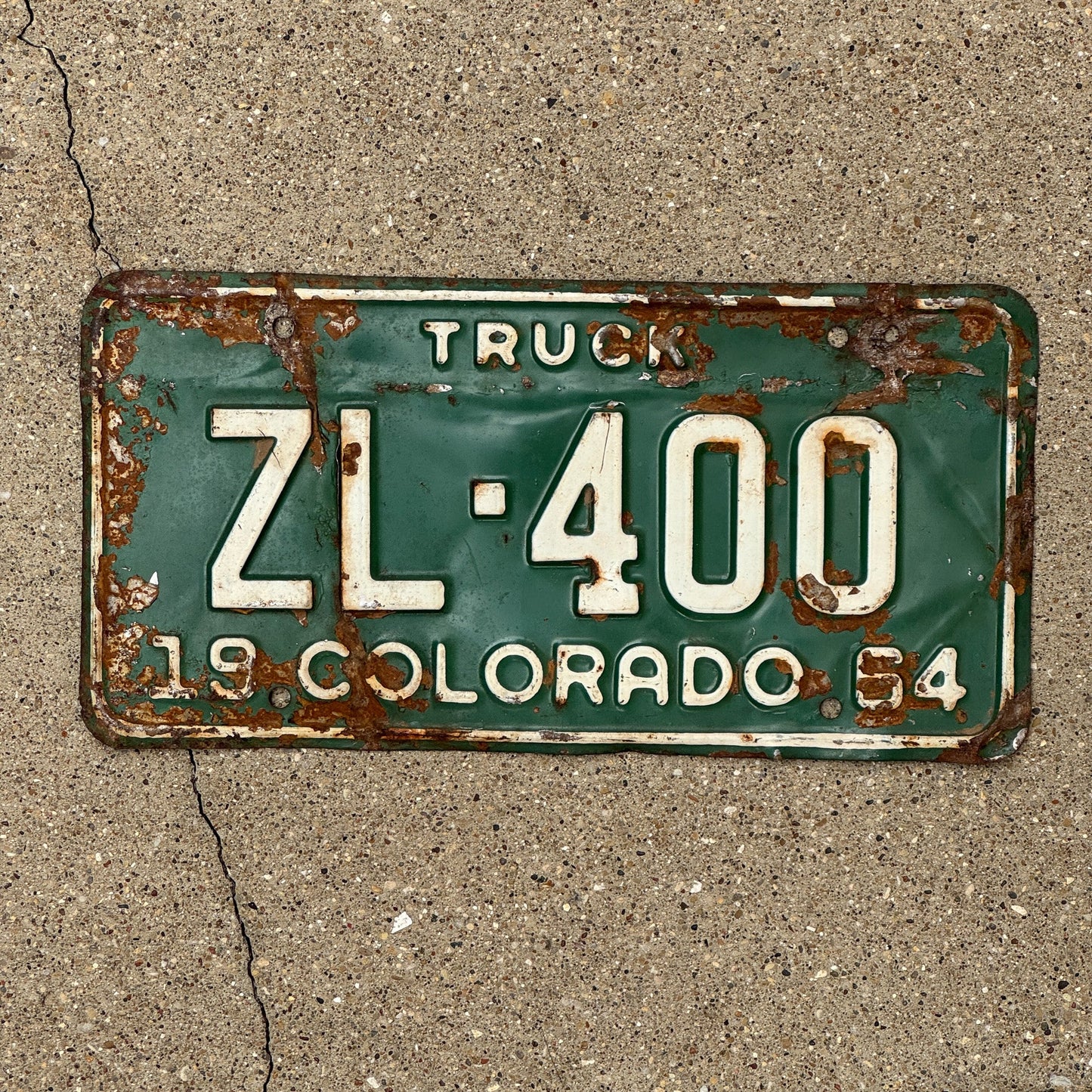 Photo of a 1964 Colorado Truck License Plate Auto Tag Garage Decor Vintage ZL 400