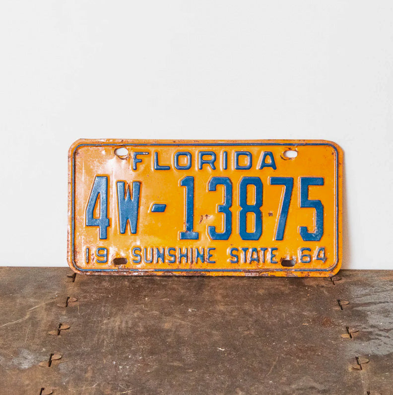 Photo of a 1964 Florida License Plate Auto Tag Garage Decor Vintage Pinellas County 4W 13875 with original patina