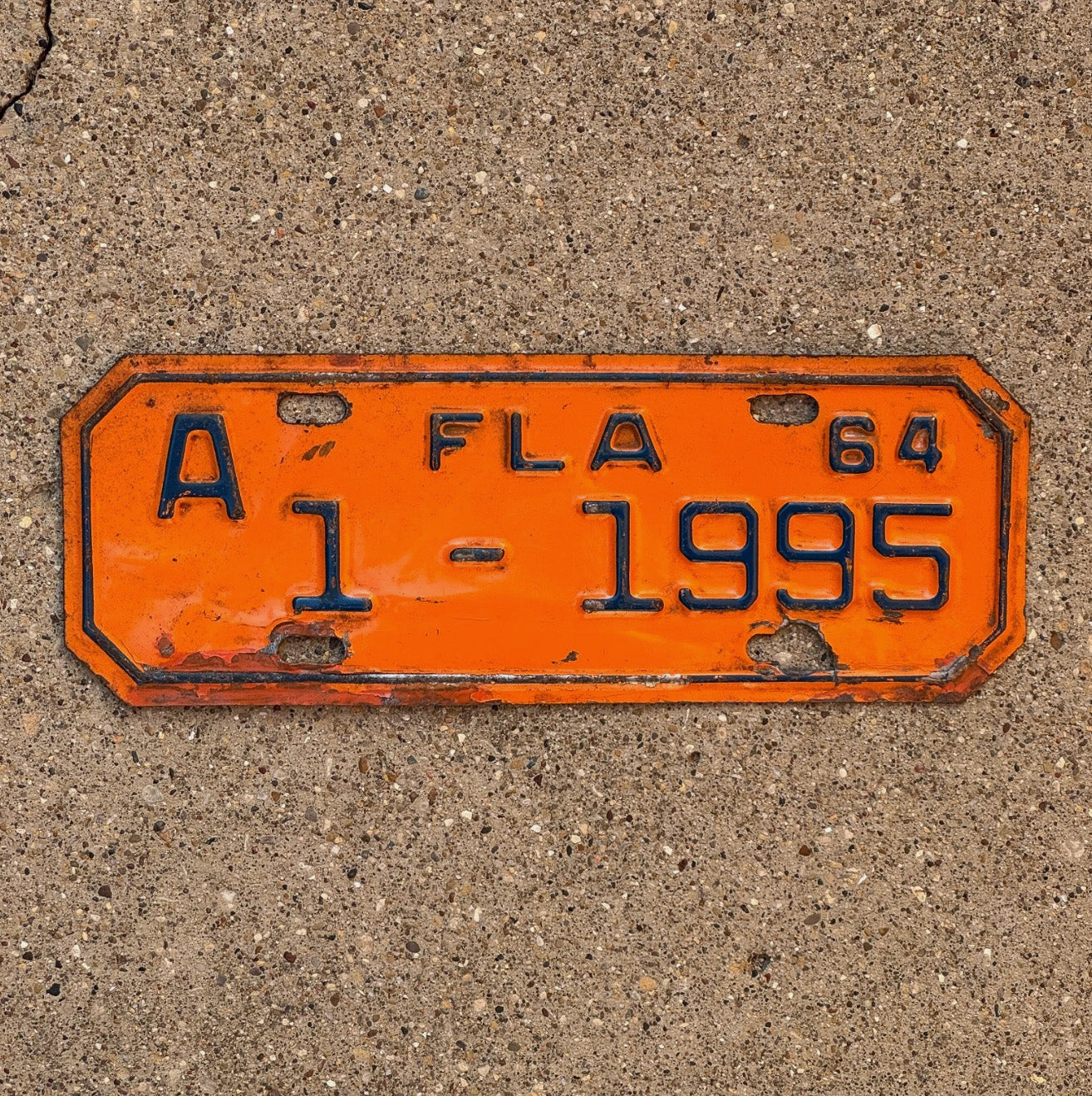 Photo of a 1964 Florida Motorcycle License Plate Auto Tag Garage Decor Vintage 1 1995 with original patina
