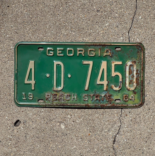 Photo of a 1964 Georgia License Plate Auto Tag Garage Decor Vintage 4D 7450 with original patina