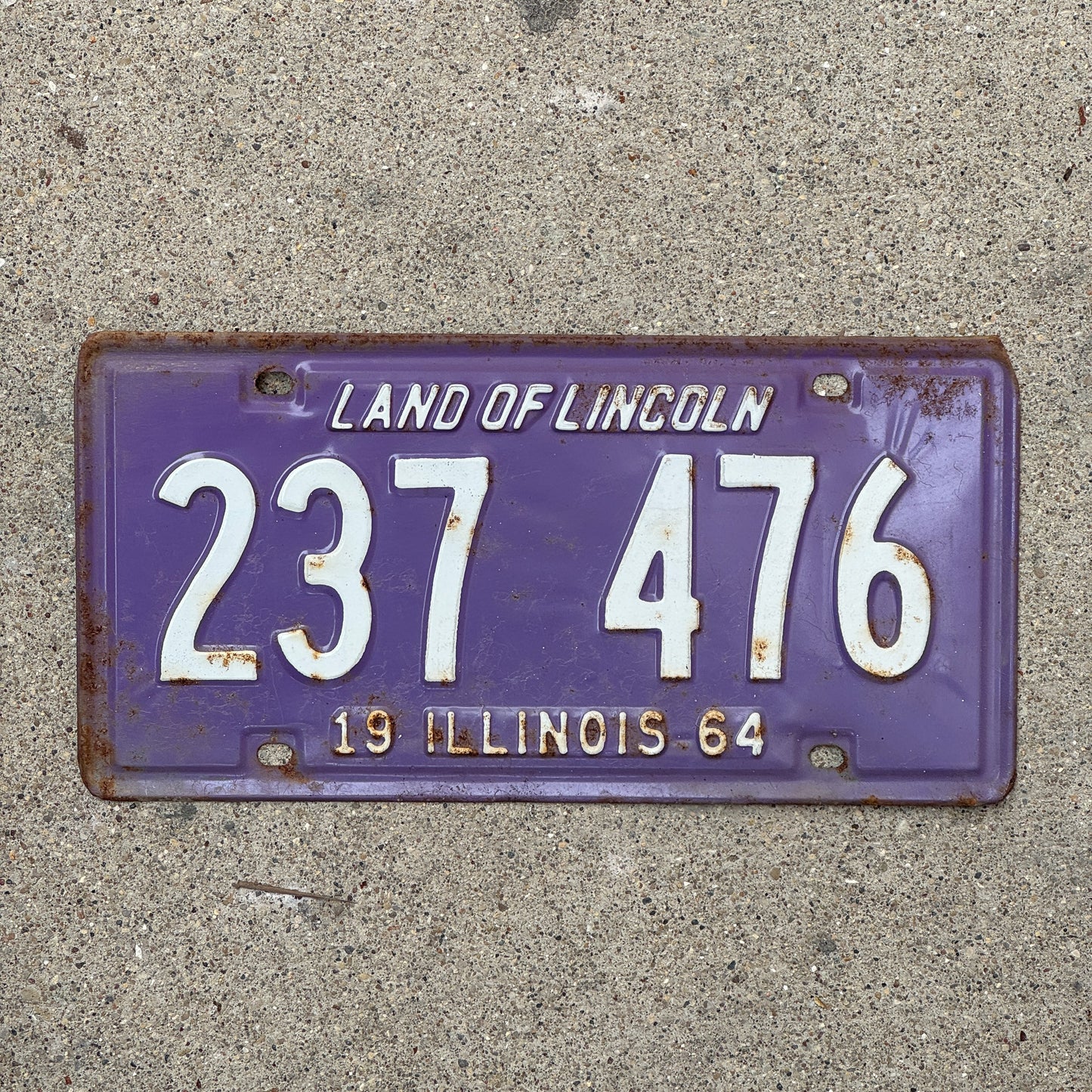 Photo of a 1964 Illinois License Plate Auto Tag 1 Vintage Garage Purple 237 476 with original patina
