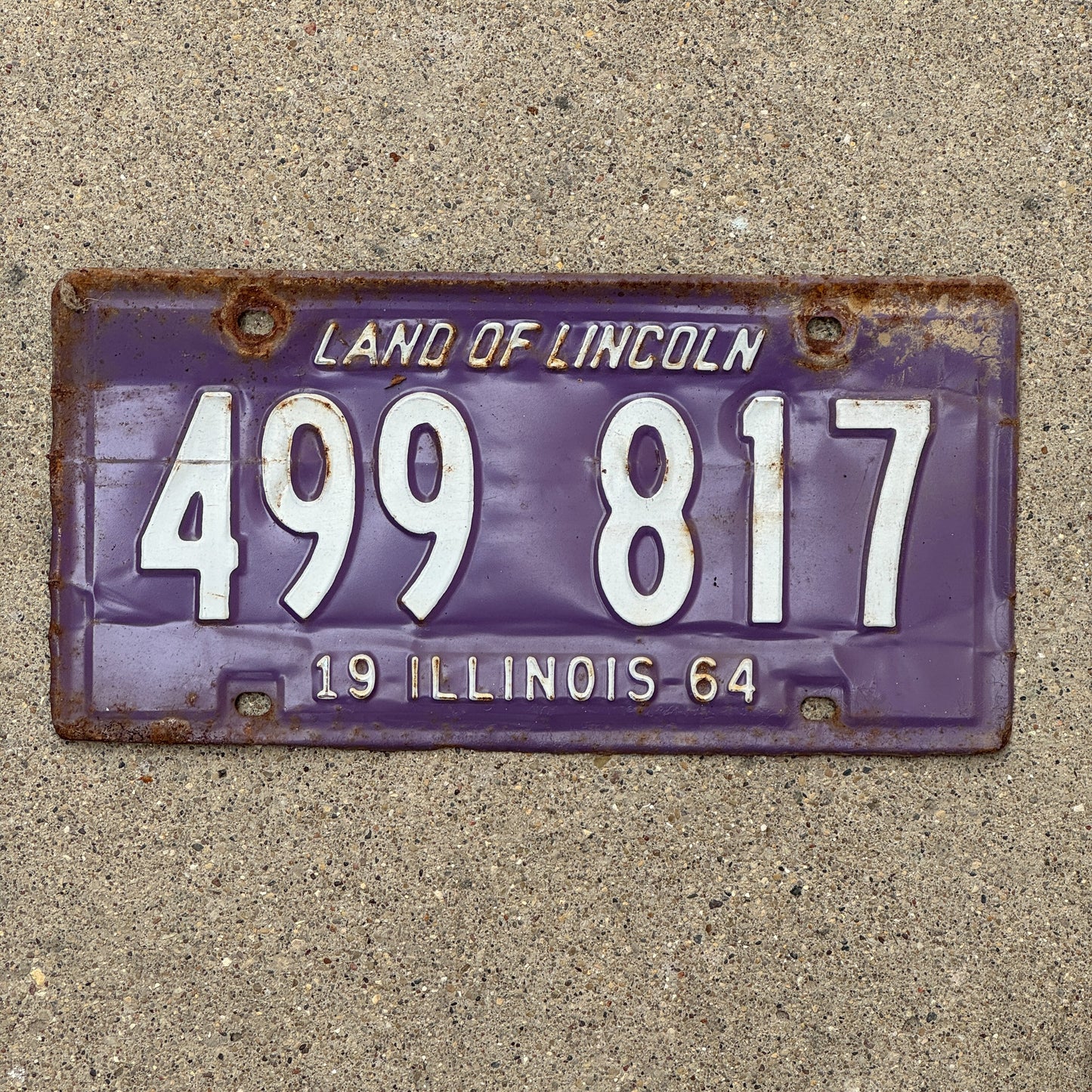 Photo of a 1964 Illinois License Plate Auto Tag 1 Vintage Garage Purple 499 817 with original patina