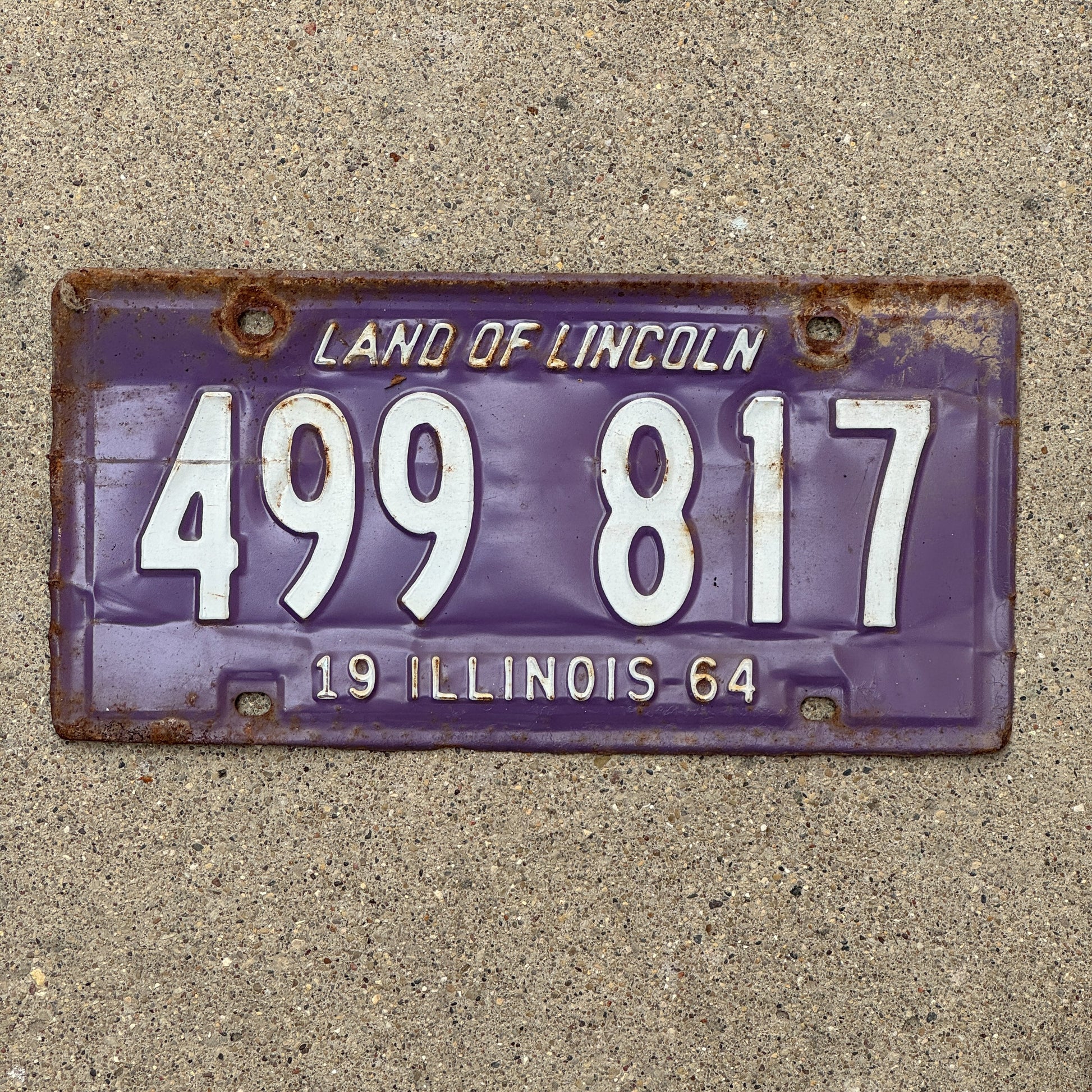 Photo of a 1964 Illinois License Plate Auto Tag 1 Vintage Garage Purple 499 817 with original patina