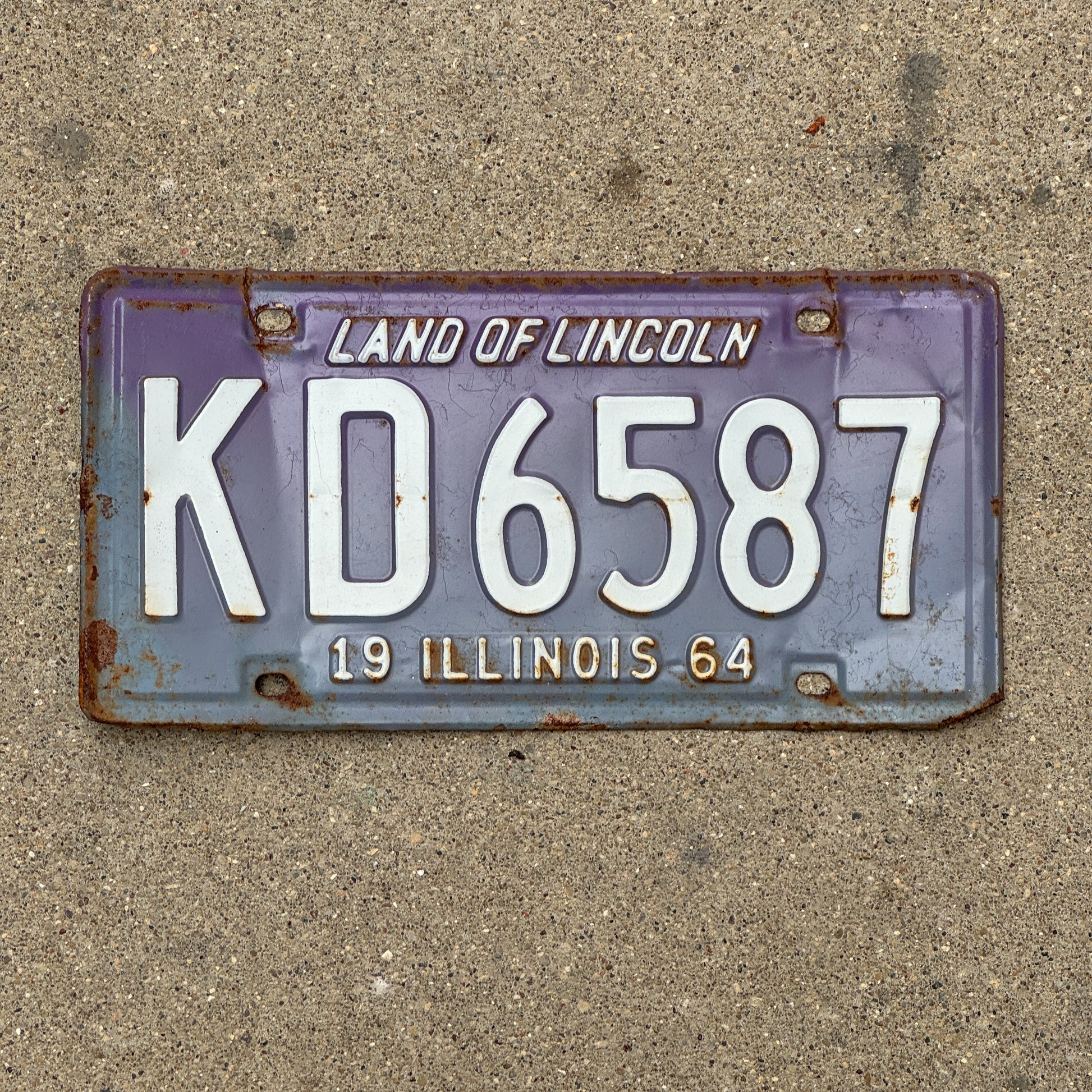 Photo of a 1964 Illinois License Plate Auto Tag 1 Vintage Garage Purple KD 6587 with original patina