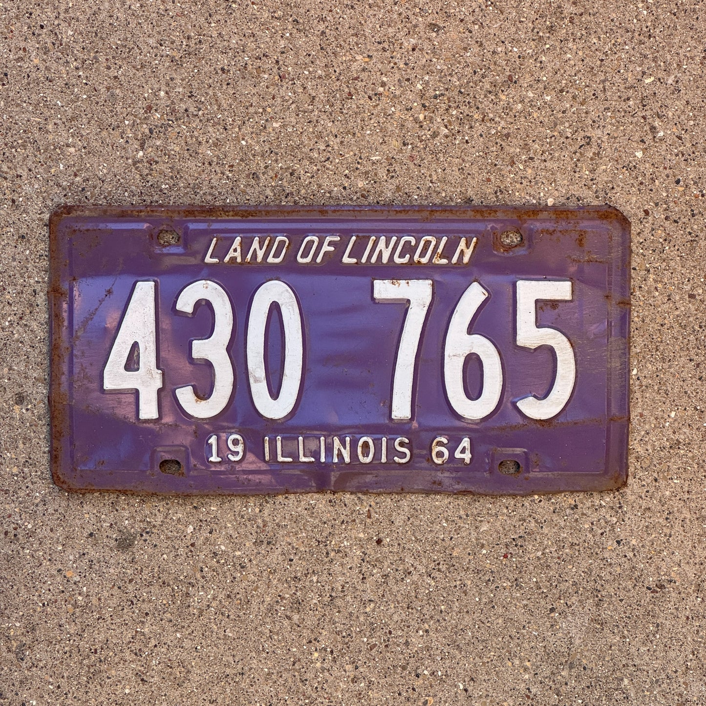 Photo of a 1964 Illinois License Plate Auto Tag 2 Vintage Garage Purple 430 765 with original patina
