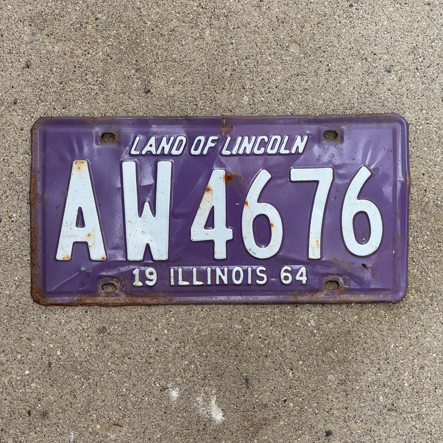 Photo of a 1964 Illinois License Plate Auto Tag Garage Decor Vintage Purple AW 4676 with original patina