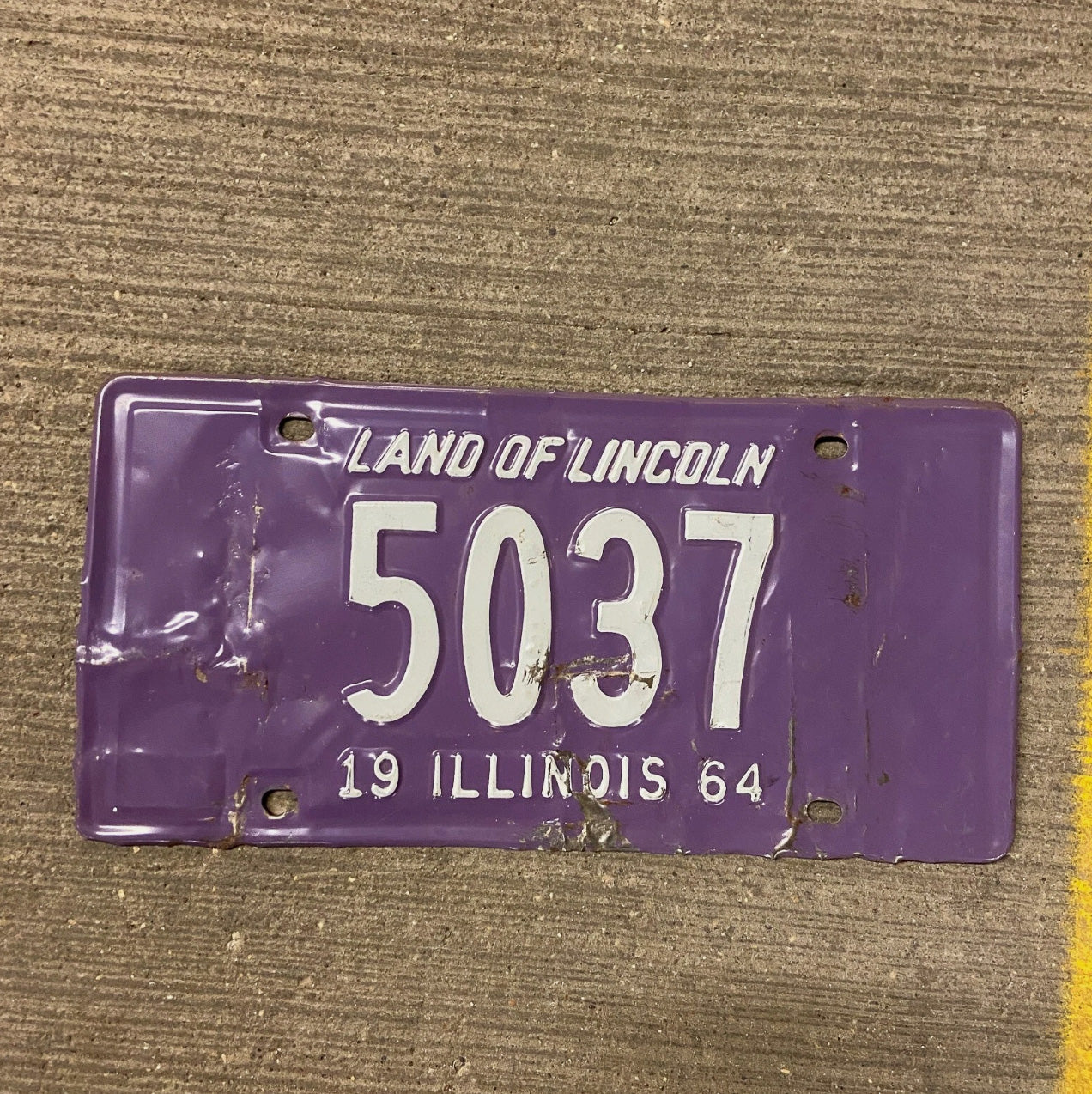 Photo of a 1964 Illinois License Plate Auto Tag Garage Decor Vintage Purple Low Number Four Digit 5037 with original patina