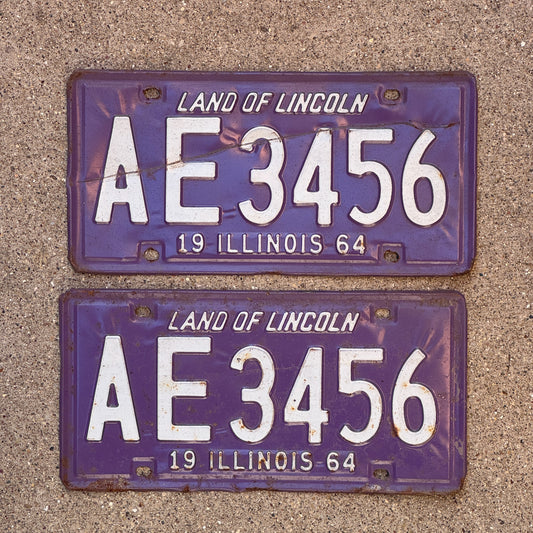 Photo of a 1964 Illinois License Plate Pair Auto Tag Garage Decor Vintage Straight Run Purple AE 3456 with original patina