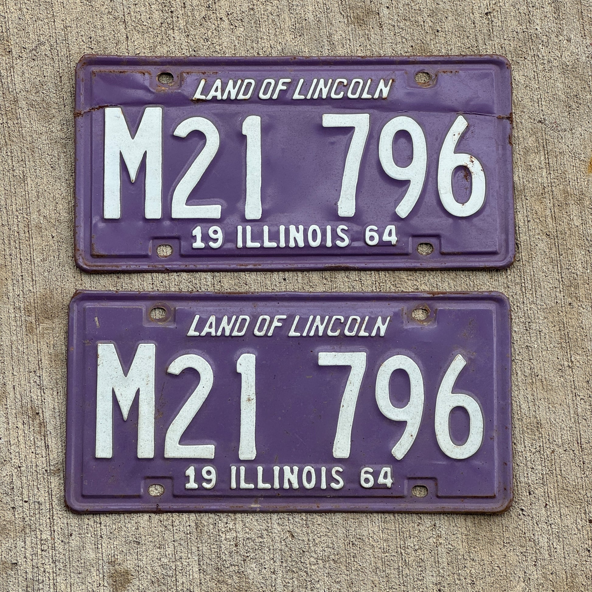 Photo of a 1964 Illinois Municipal License Plate Pair Auto Tag Garage Decor Vintage Purple M 21 796 with original patina