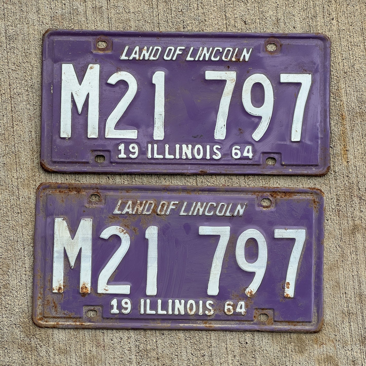 Photo of a 1964 Illinois Municipal License Plate Pair Auto Tag Garage Decor Vintage Purple M 21 797 with original patina