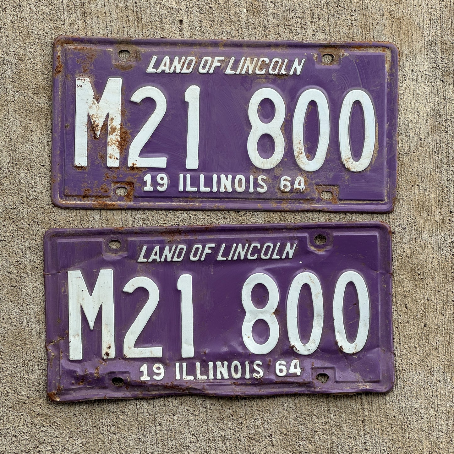 Photo of a 1964 Illinois Municipal License Plate Pair Auto Tag Garage Decor Vintage Purple M 21 800 with original patina