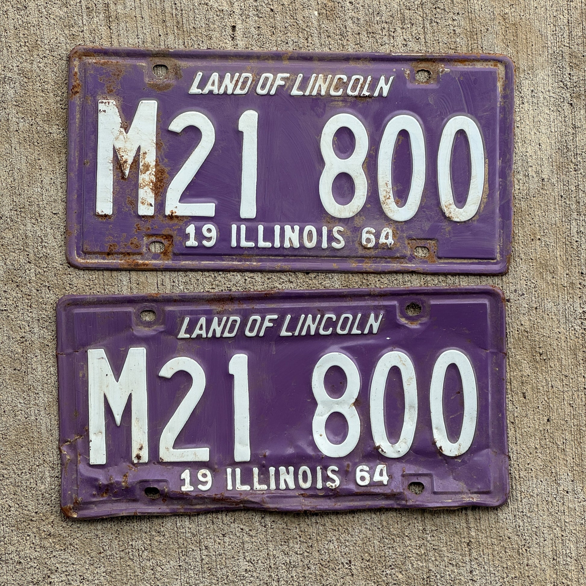 Photo of a 1964 Illinois Municipal License Plate Pair Auto Tag Garage Decor Vintage Purple M 21 800 with original patina