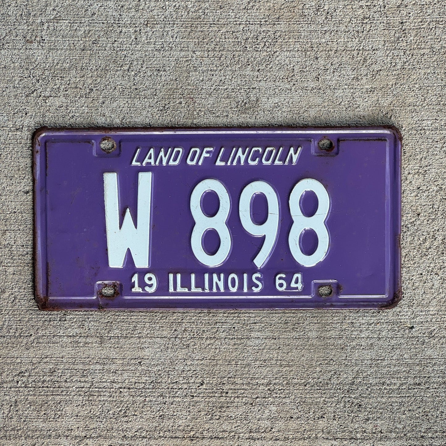 Photo of a 1964 Illinois Trailer License Plate Auto Tag Garage Decor Vintage Low Number Three Digit W 898 with original patina