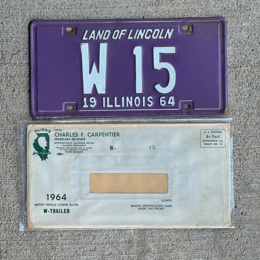 Photo of a 1964 Illinois Trailer License Plate Auto Tag Garage Decor Vintage Low Number Two Digit with Envelope W 15 with original patina