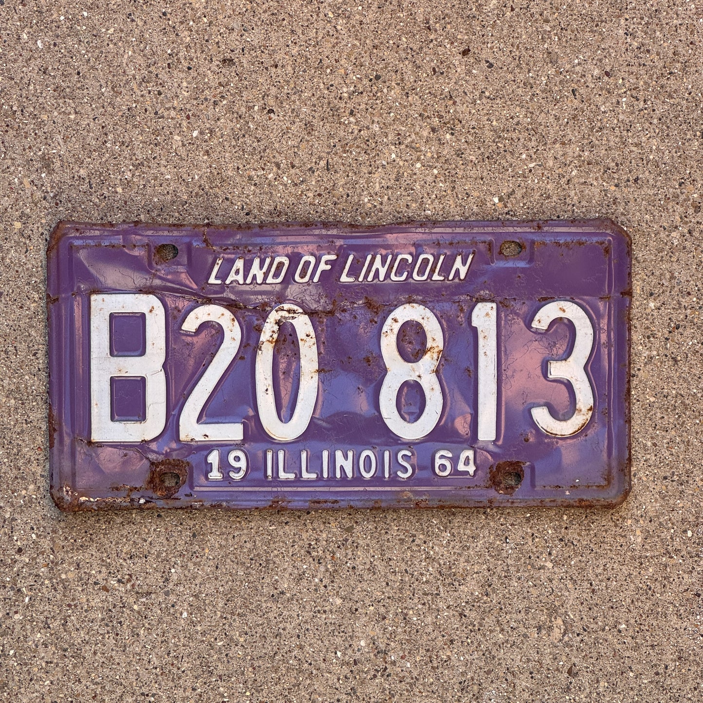 Photo of a 1964 Illinois Truck License Plate Auto Tag 1 Vintage Garage Purple B 20 813 with original patina
