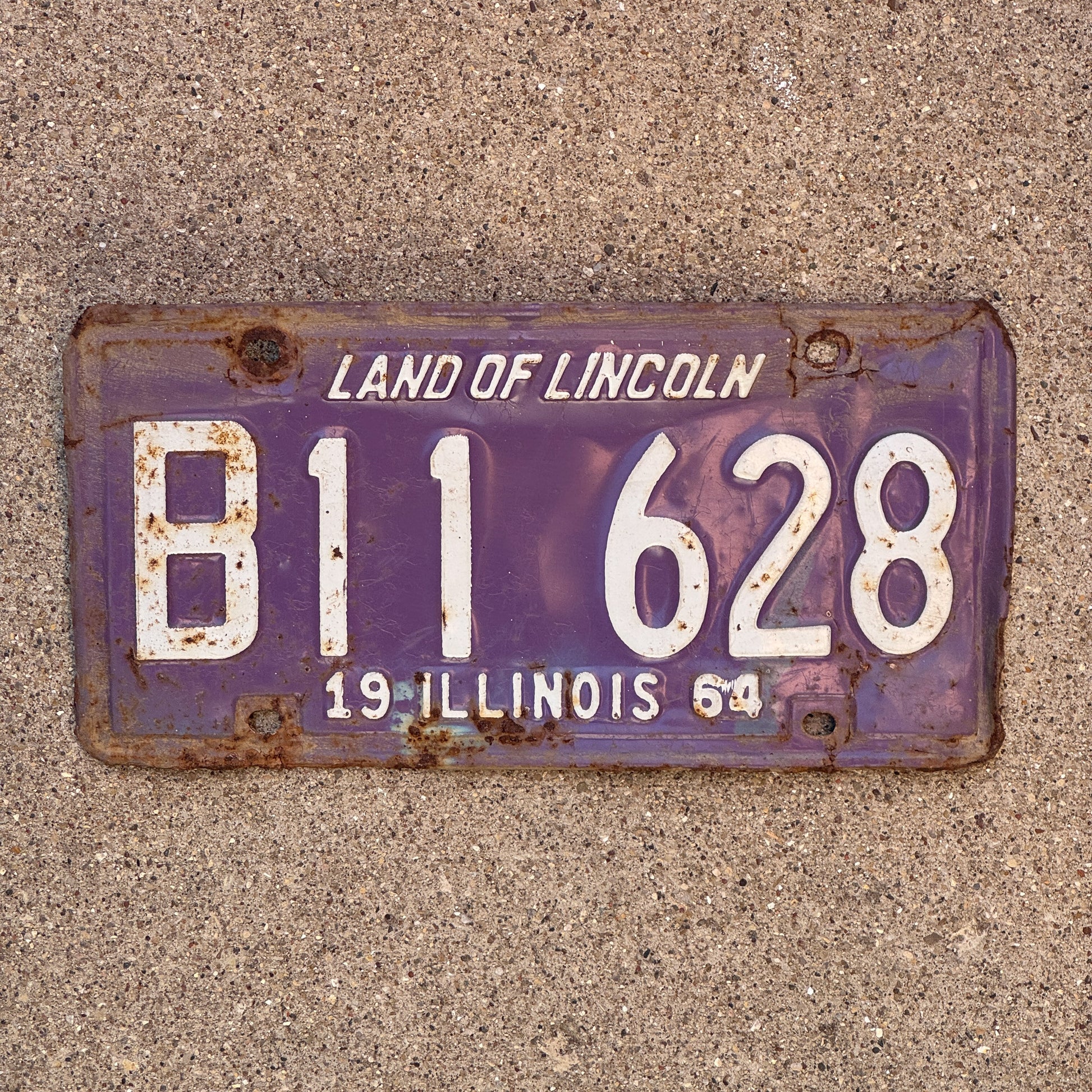 Photo of a 1964 Illinois Truck License Plate Auto Tag 2 Vintage Garage Purple B 11 628 with original patina