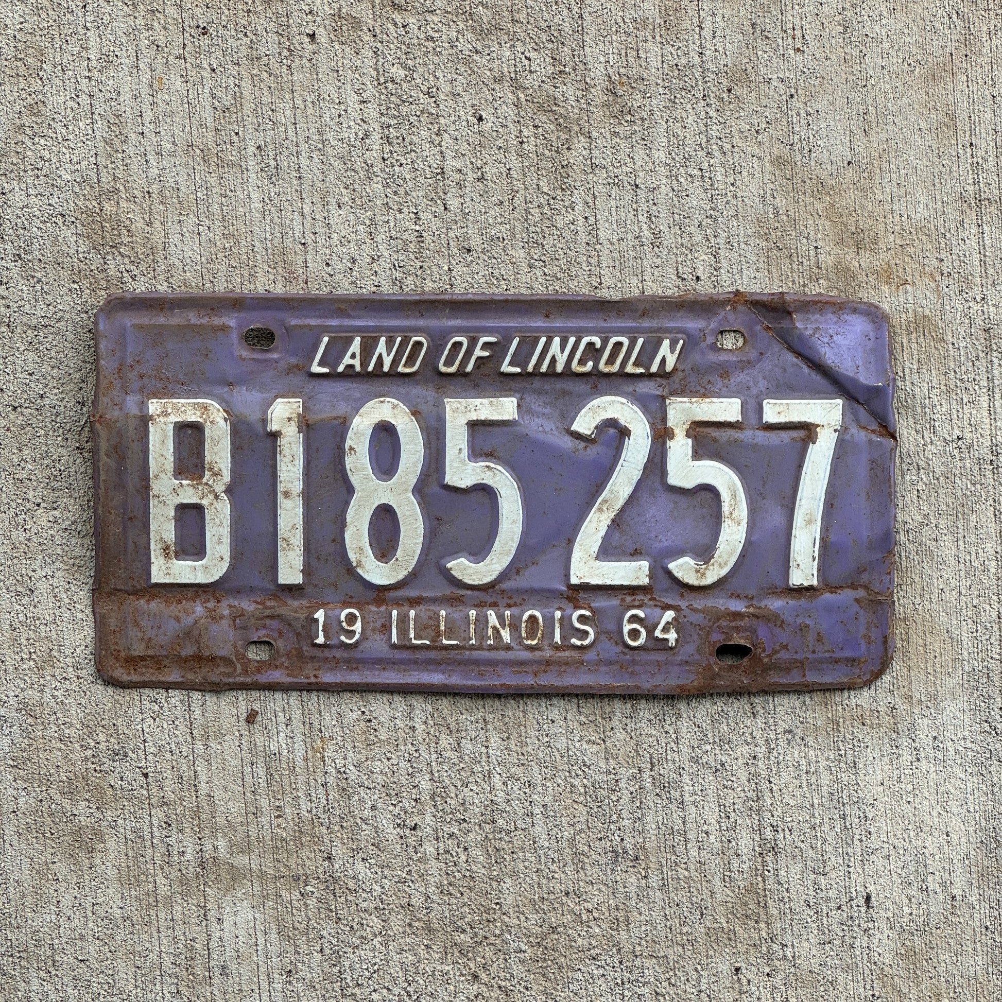 Photo of a 1964 Illinois Truck License Plate Auto Tag Garage Decor Vintage Purple B 185 257 with original patina