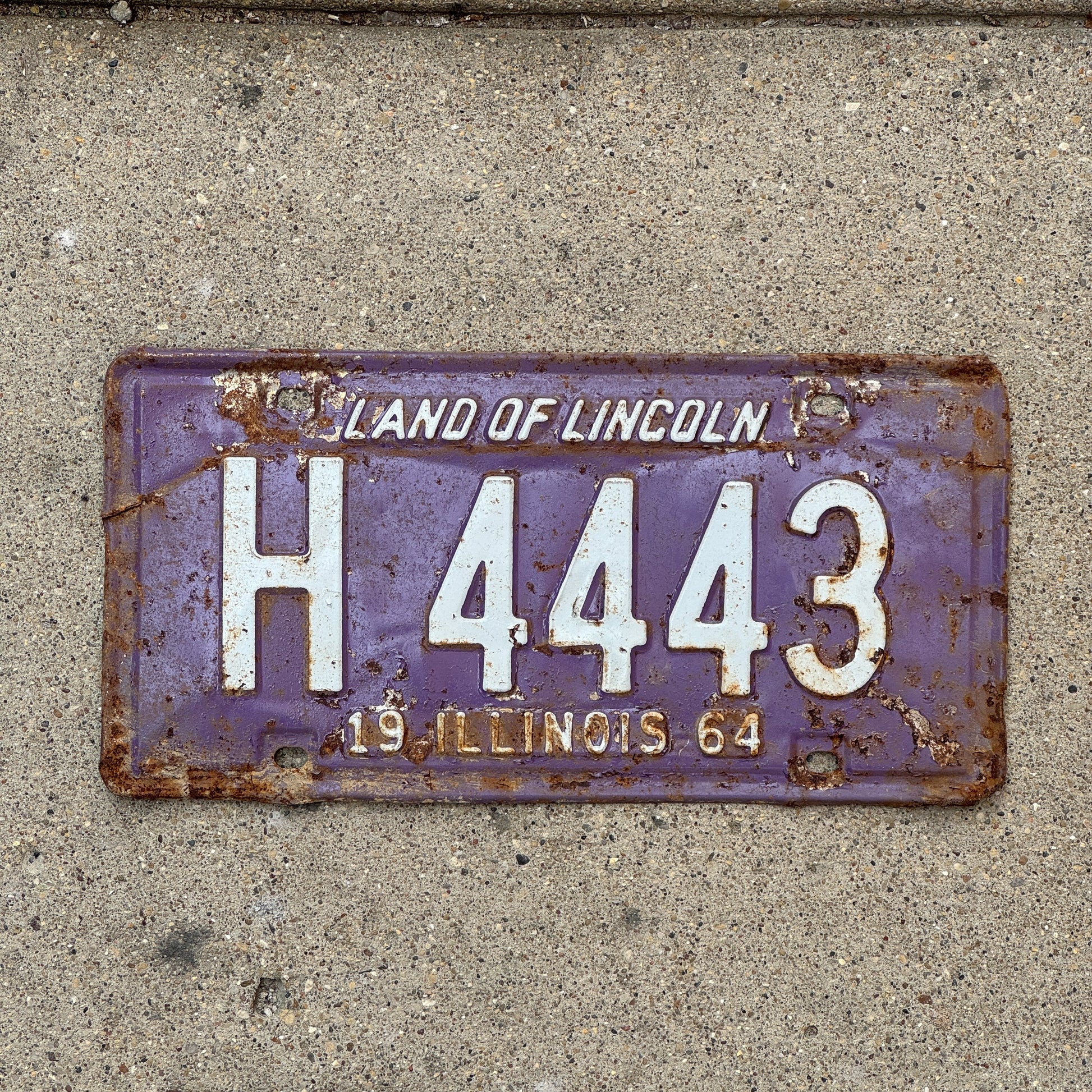 Photo of a 1964 Illinois Truck License Plate Auto Tag Garage Decor Vintage Repeat Repeating Purple H 4443 with original patina