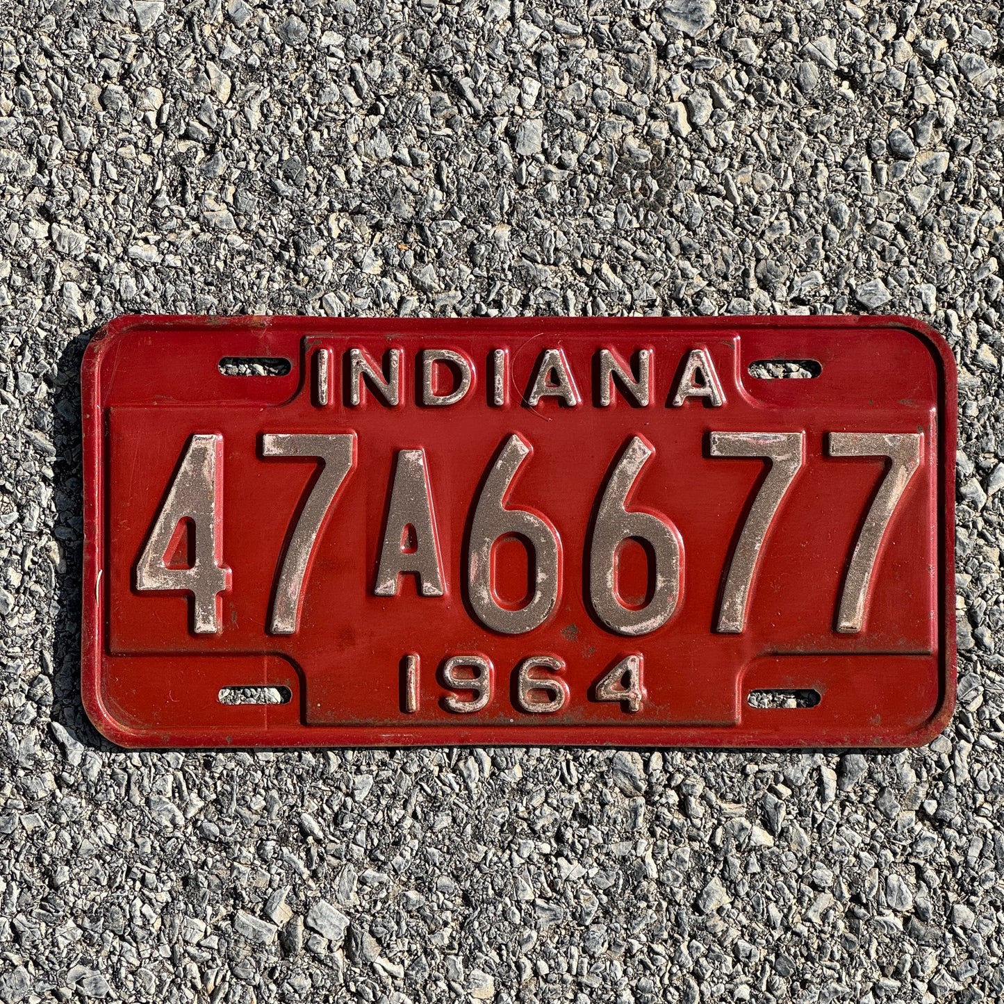 Photo of a 1964 Indiana License Plate Auto Tag Garage Decor Vintage 47A6677
